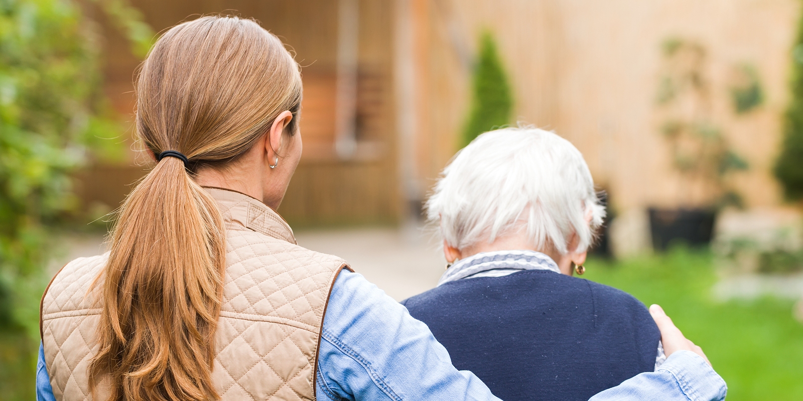 Caregiver-Helping-Elderly-woman-Walk