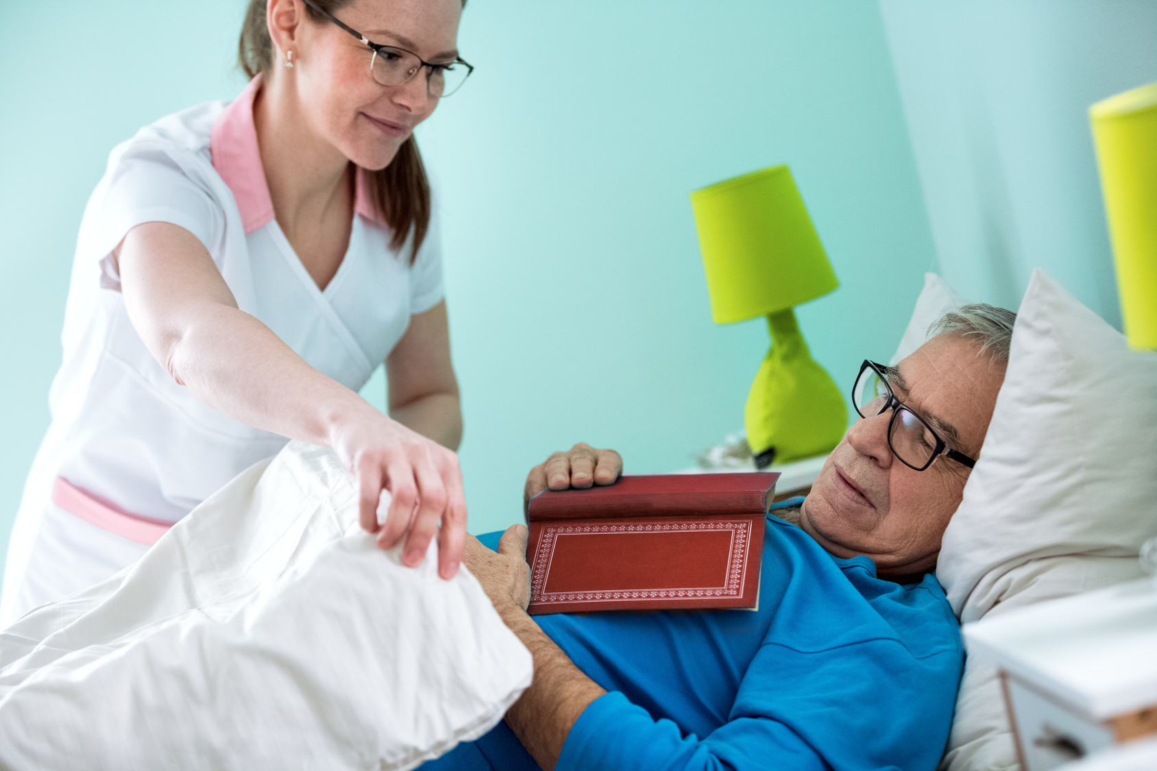 Caregiver-Caring-for-Sleeping-Senior