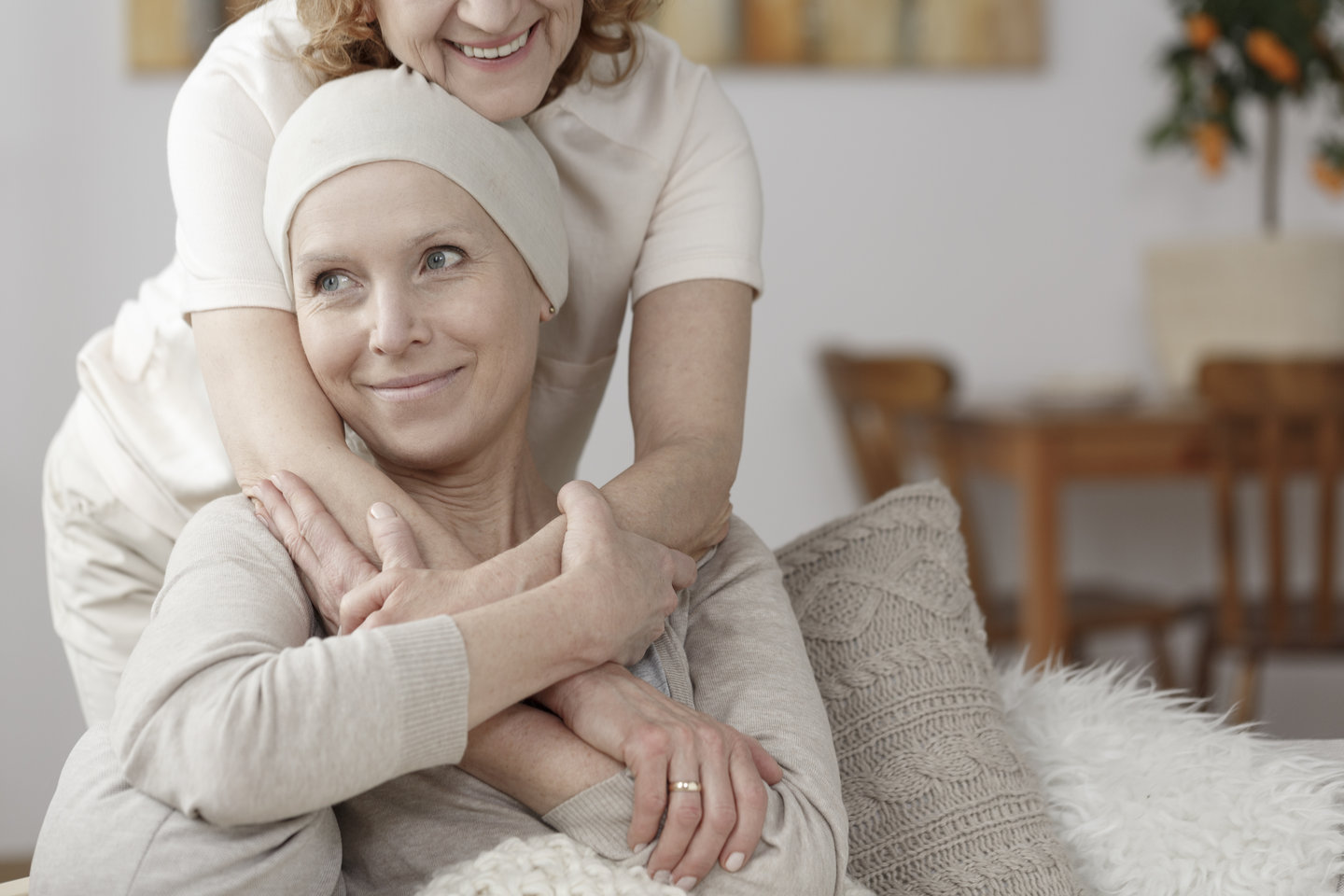 Caregiver-Hugging-Disabled-Woman