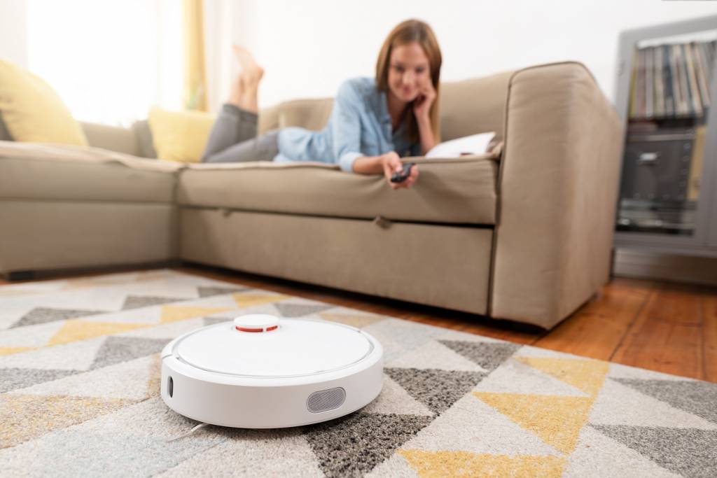 Robotic vacuum cleaner cleaning the room
