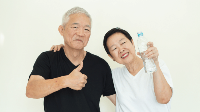 Seniors drinking water to stay hydrated